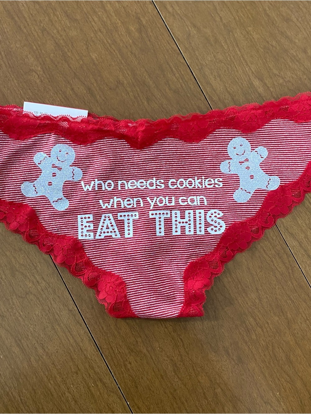 Women's Red Lace-Trim Briefs with Playful Gingerbread Graphic